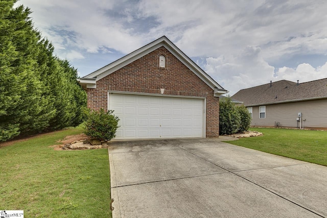 garage featuring a yard