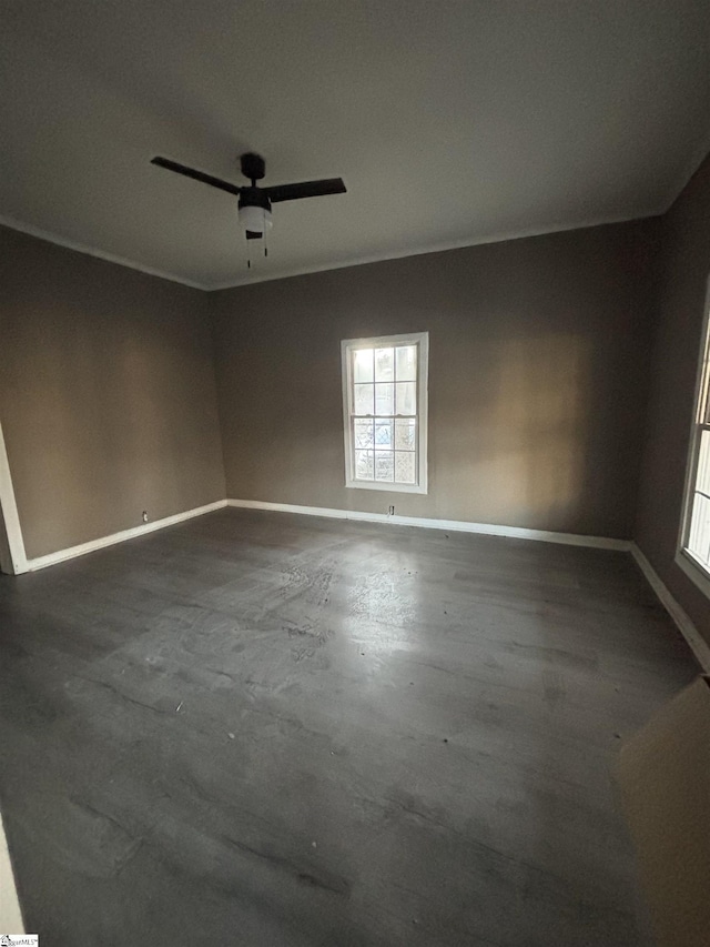 empty room featuring ceiling fan