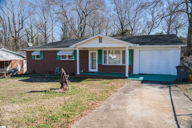 ranch-style home with a front yard and a garage