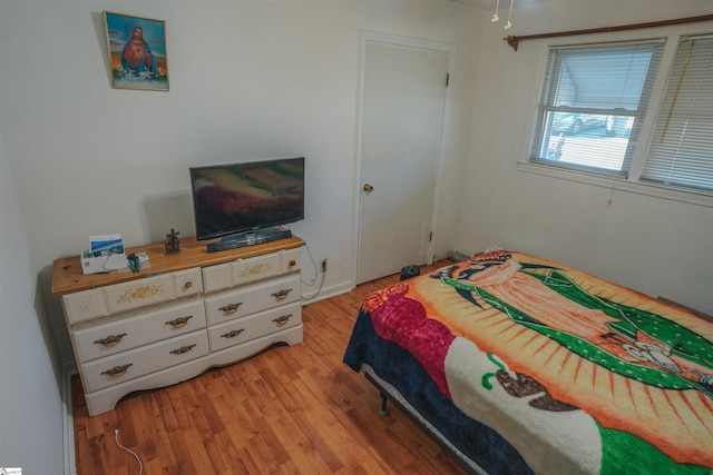 bedroom featuring light wood-type flooring