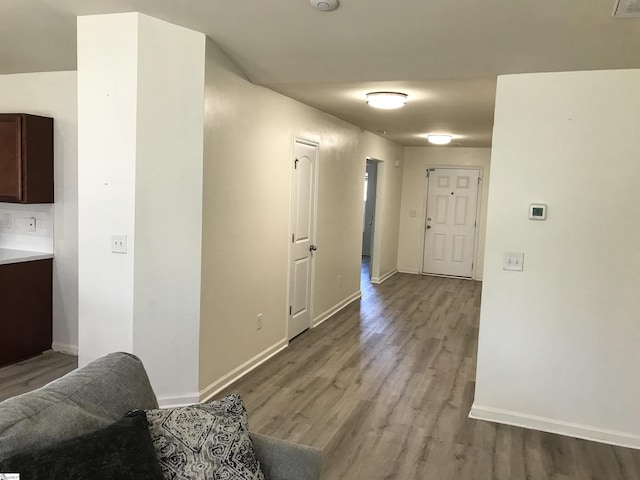 corridor featuring light hardwood / wood-style flooring