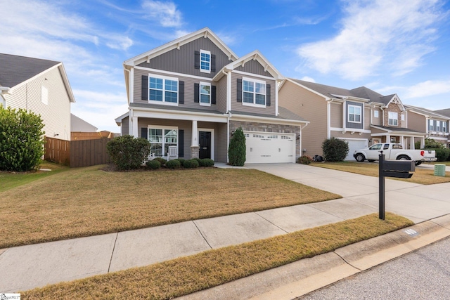 view of front facade with a front yard and a garage