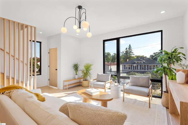 living room featuring an inviting chandelier