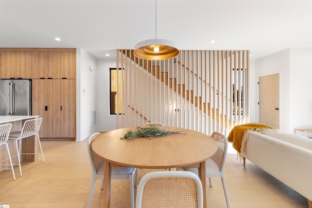 dining area featuring light hardwood / wood-style flooring