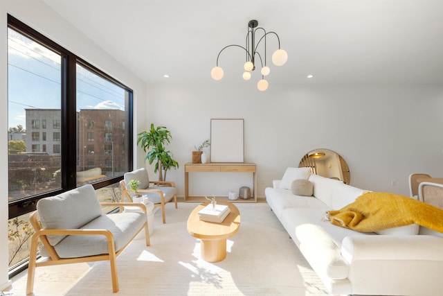 living room featuring a notable chandelier