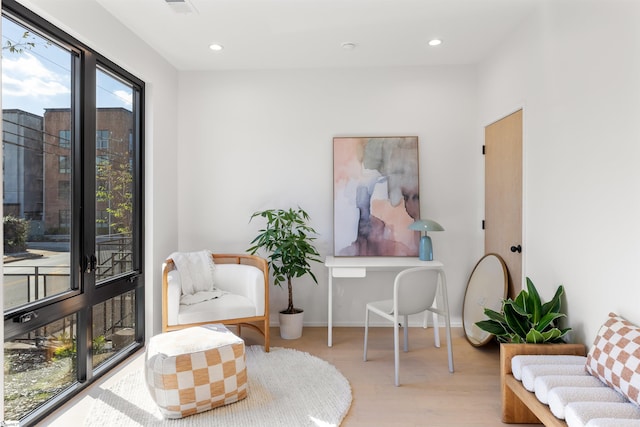 living area featuring light hardwood / wood-style flooring