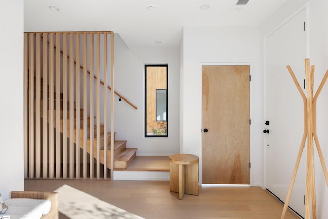 interior space with hardwood / wood-style floors