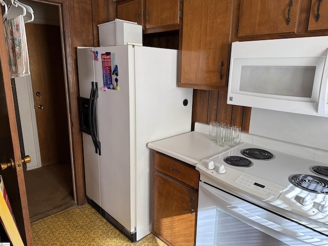 kitchen featuring white appliances