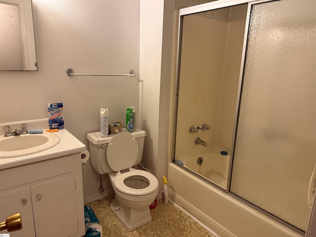 full bathroom featuring shower / bath combination with glass door, vanity, and toilet