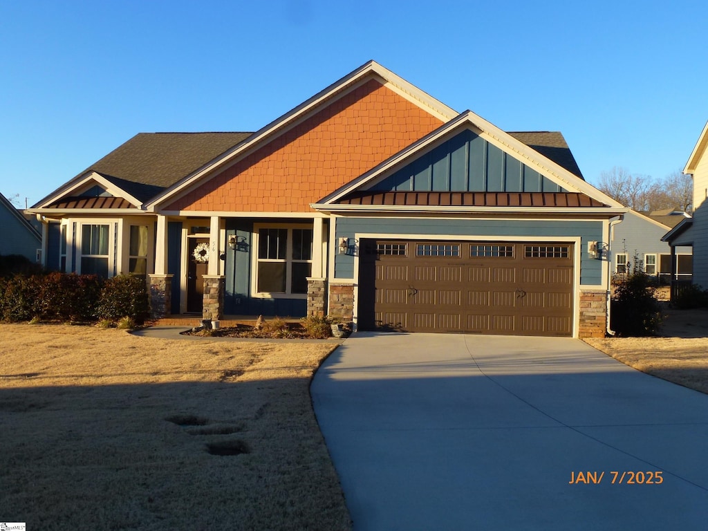 craftsman-style house with a garage