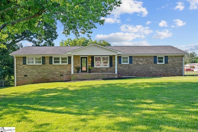 ranch-style house with a front lawn