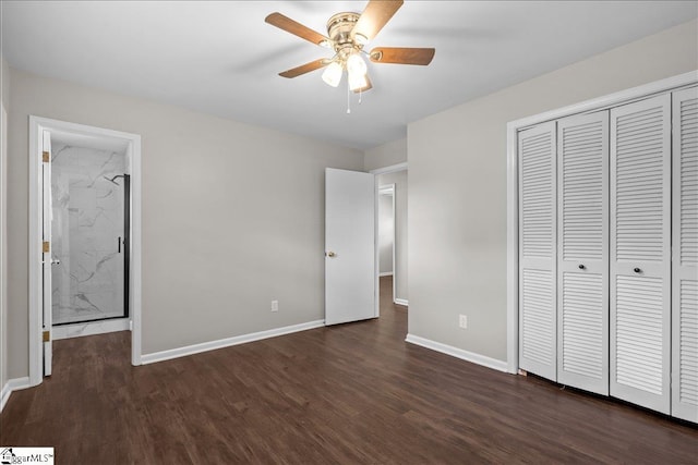 unfurnished bedroom featuring ceiling fan, dark hardwood / wood-style flooring, and a closet