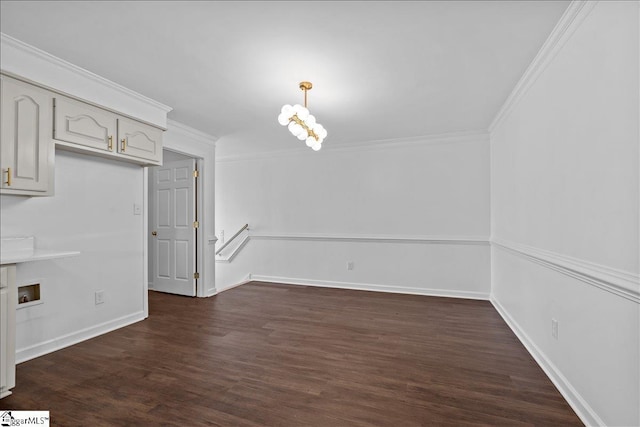 unfurnished dining area with crown molding and dark wood-type flooring