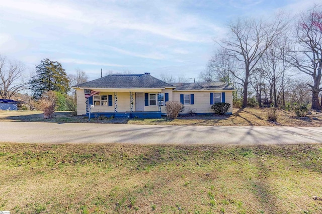 single story home with covered porch