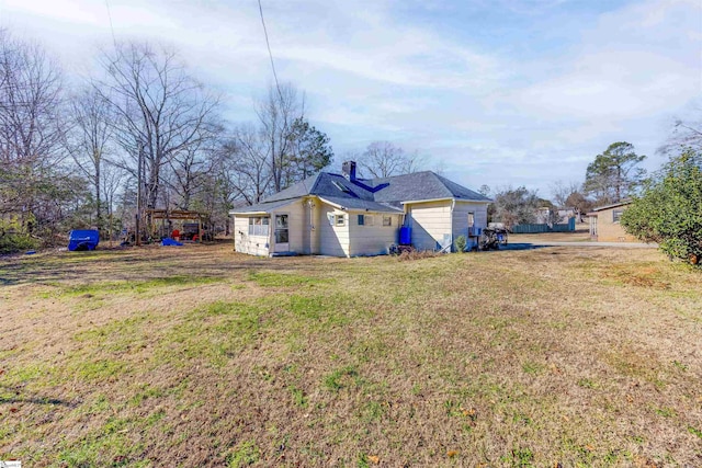 exterior space with a yard