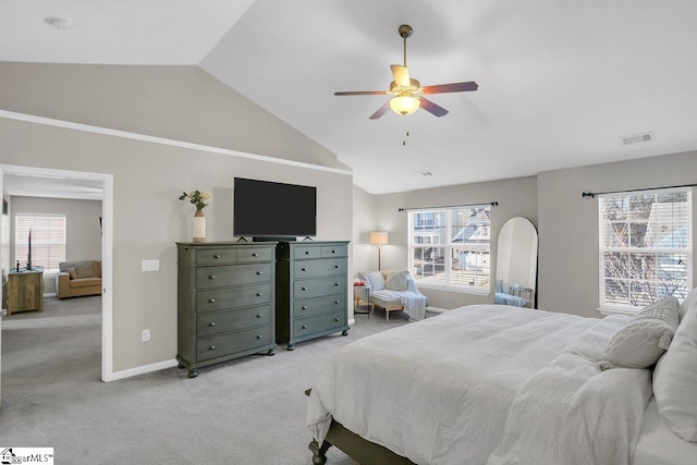 carpeted bedroom featuring ceiling fan and lofted ceiling