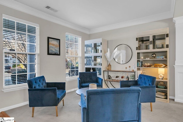 sitting room featuring light carpet and crown molding