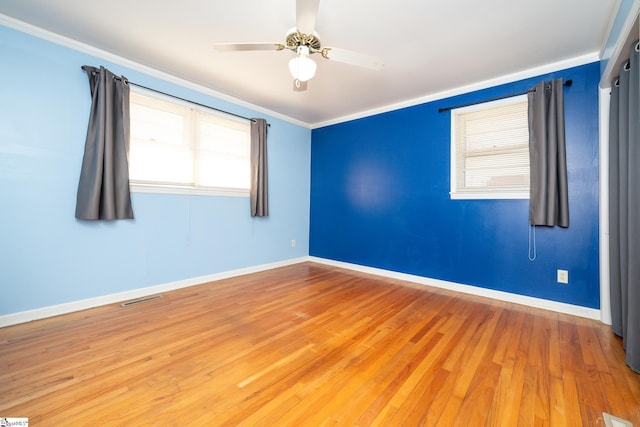 unfurnished room with crown molding, ceiling fan, and hardwood / wood-style flooring