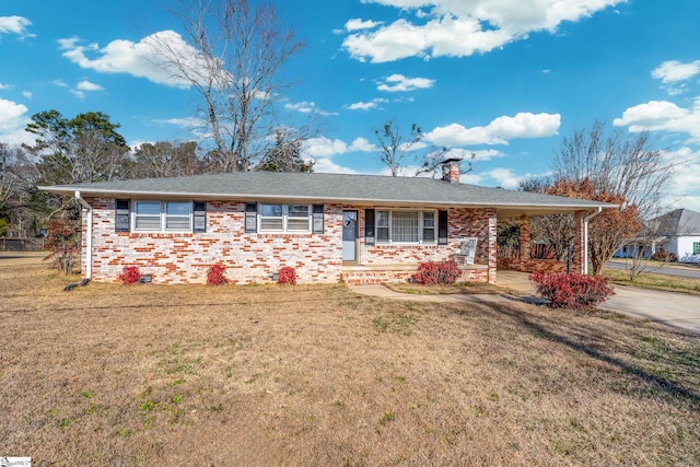 single story home featuring a front yard