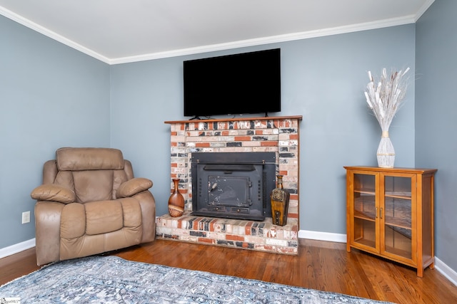 living room featuring wood-type flooring and ornamental molding