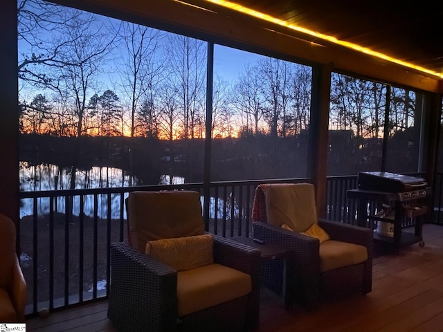 sunroom with a water view