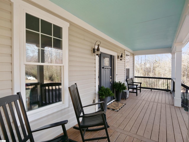 wooden deck featuring a porch