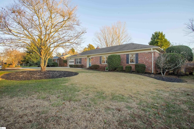 ranch-style house with a front yard