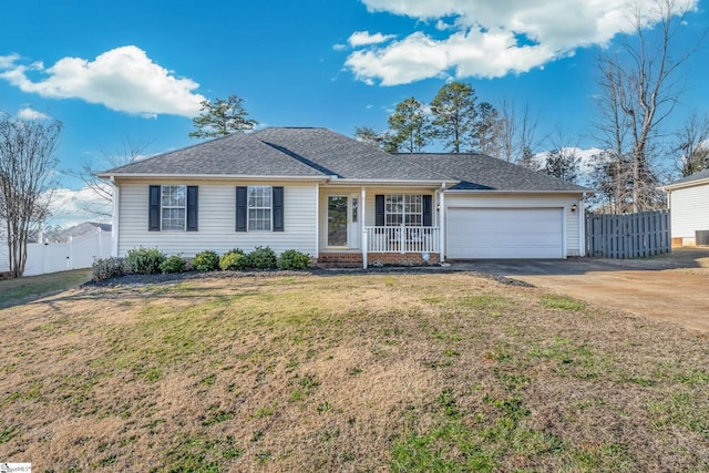 single story home with a front yard, a porch, and a garage