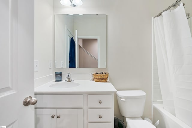 full bathroom with vanity, toilet, and shower / bath combo