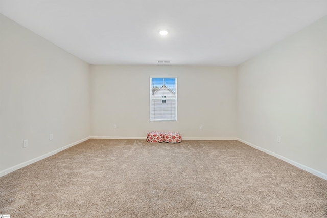 view of carpeted spare room