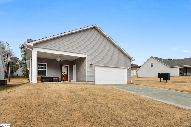 view of front of property with central AC unit, ceiling fan, covered porch, and a front yard