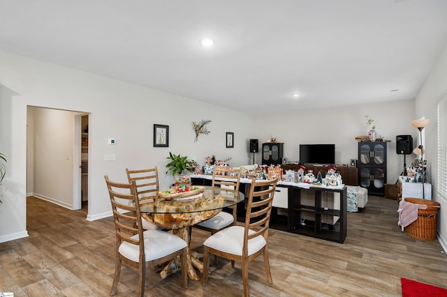 dining area with light wood-type flooring