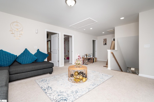 living room featuring light carpet