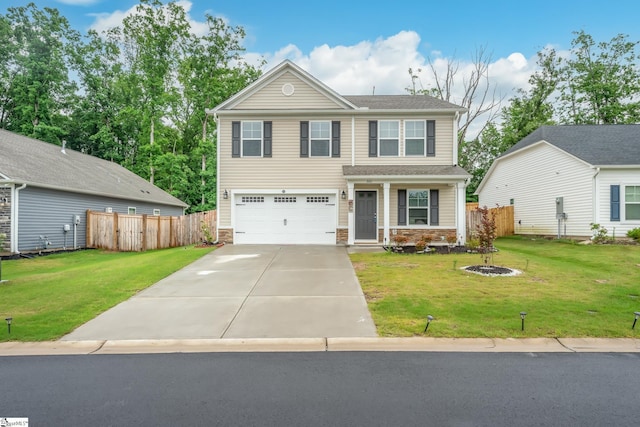 view of front of home featuring a front lawn and a garage