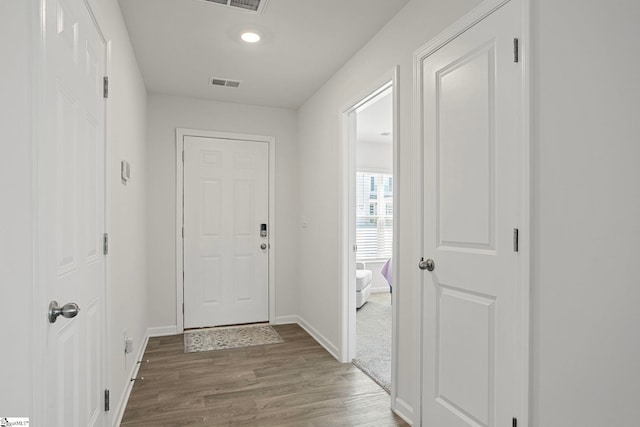 doorway to outside featuring hardwood / wood-style floors