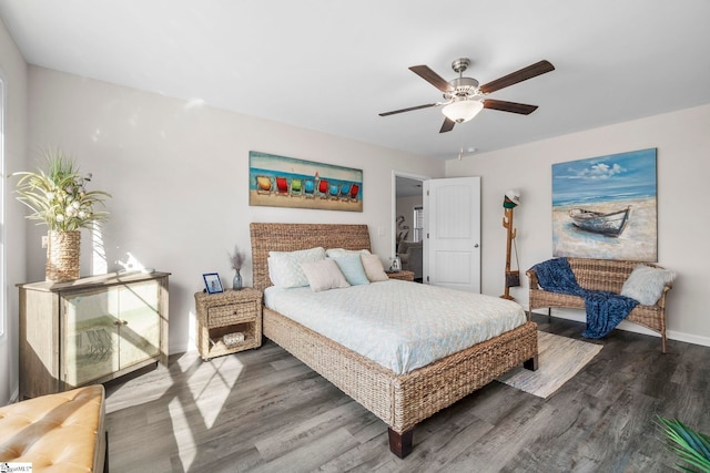 bedroom with hardwood / wood-style flooring and ceiling fan