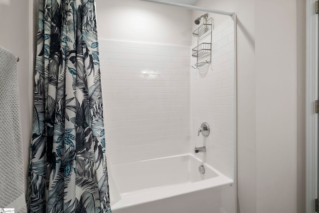 bathroom with shower / bathtub combination with curtain