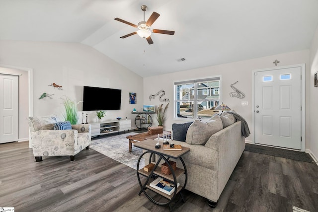 living room with hardwood / wood-style flooring, ceiling fan, and lofted ceiling