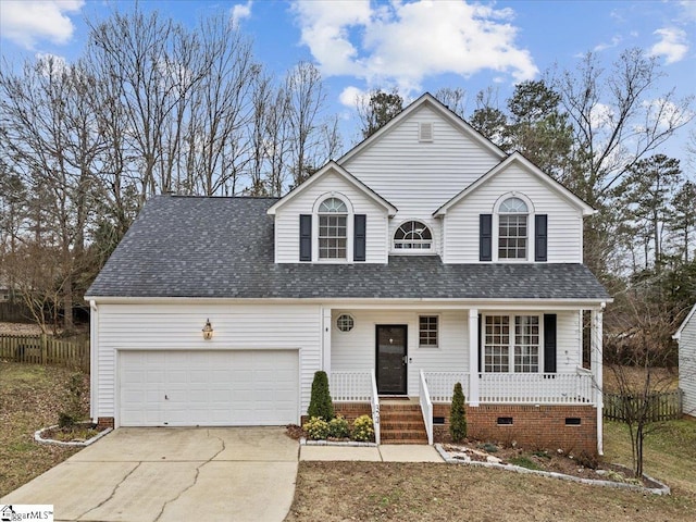 view of front of house with a porch and a garage