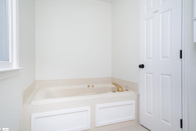 bathroom featuring a tub