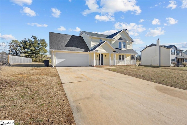 view of front of home with a porch, a garage, and a front lawn