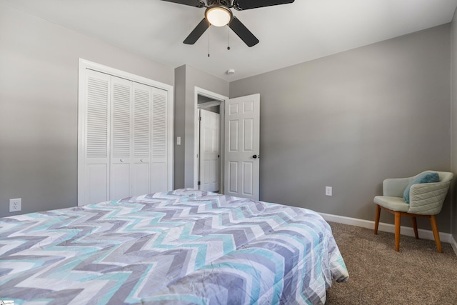 carpeted bedroom with a closet, a ceiling fan, and baseboards