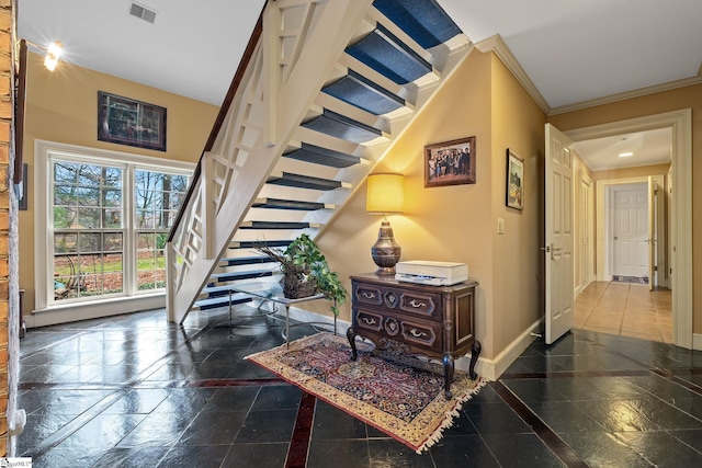 stairway with crown molding