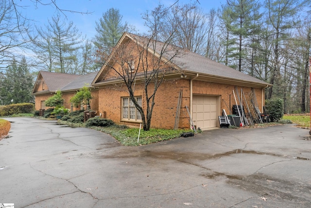 view of property exterior with a garage