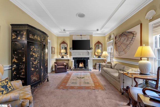 living room featuring carpet, a premium fireplace, and crown molding