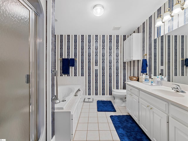 full bathroom with tile patterned flooring, vanity, toilet, and independent shower and bath