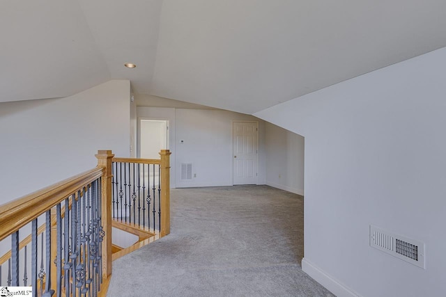 bonus room featuring carpet and lofted ceiling