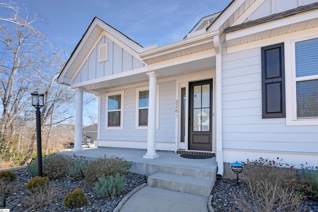 doorway to property featuring a porch