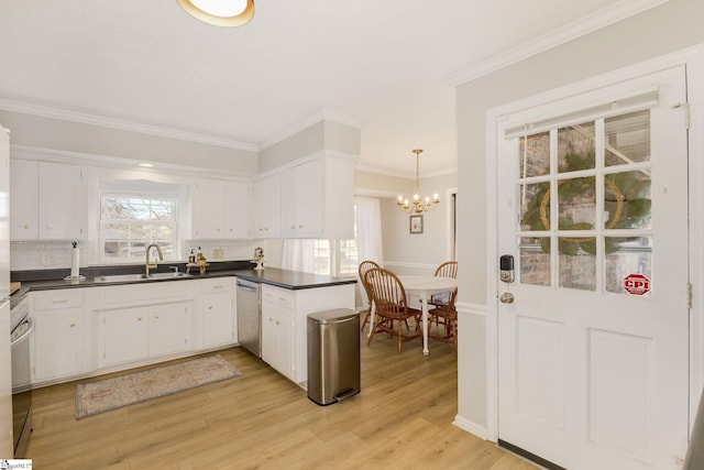 kitchen with white cabinets, stainless steel dishwasher, and light wood-type flooring