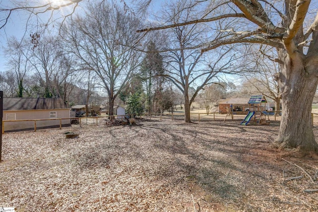 view of yard with a playground